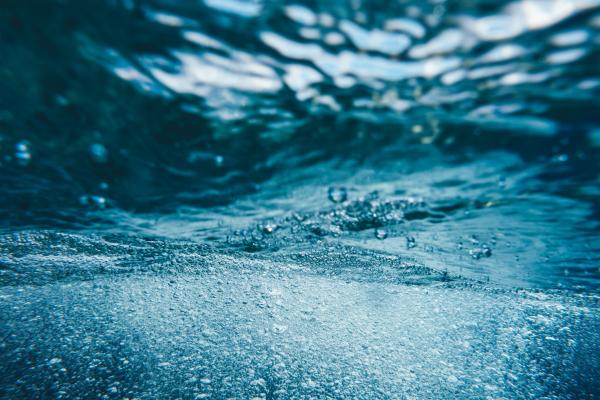 Underwater splash with bubbles